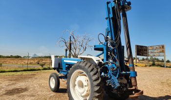 FORD TRACTOR WITH DRILL ATTACHMENT