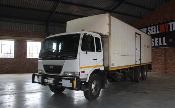 2007 Nissan UD 90 Volume Body With Tag Axle