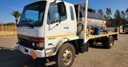 2009 MITSUBISHI FUSO INTERCOOLED FM14-213 FLAT DECK WITH FUEL TANKER